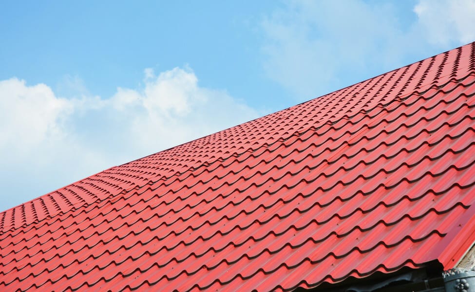 Red metal roofing shingle